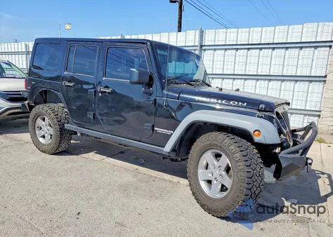 2012 Jeep Wrangler Unlimited Rubicon из США, поврежденный, VIN 1C4BJWFG9CL110951